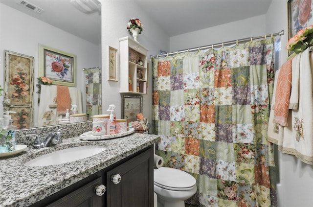 1440 Glade Meadows Dr, Burleson, TX 76058 - bathroom featuring toilet, vanity, and curtained shower