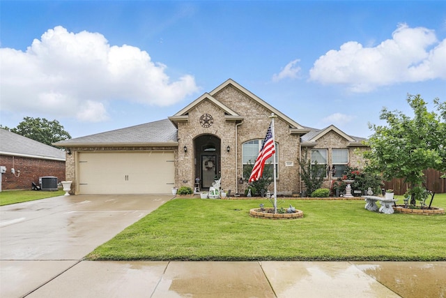 1440 Glade Meadows Dr, Burleson, TX 76058 - view of front of house featuring a garage, concrete driveway, a front lawn, and brick siding