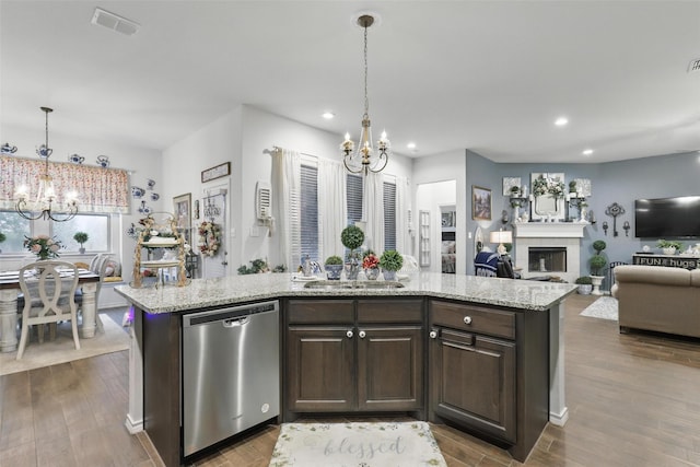 1440 Glade Meadows Dr, Burleson, TX 76058 - kitchen with stainless steel dishwasher, a chandelier, recessed lighting, a sink, and dark brown cabinets