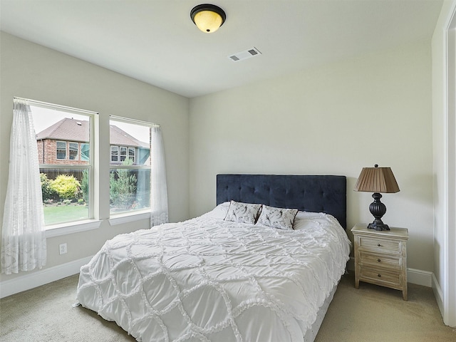 2165 Hidalgo Ln, Frisco, TX 75034 - bedroom featuring light carpet and baseboards