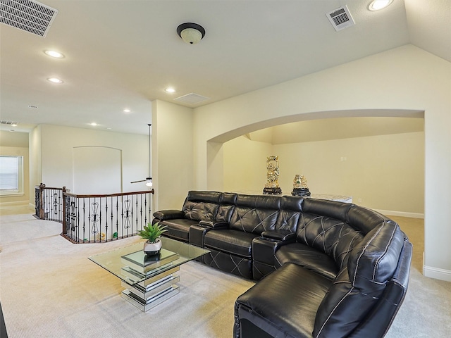 2165 Hidalgo Ln, Frisco, TX 75034 - living area featuring light carpet, arched walkways, recessed lighting, baseboards, and lofted ceiling