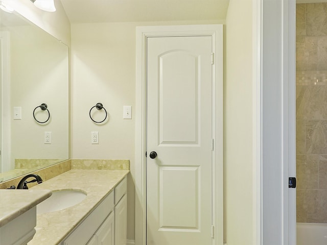 2165 Hidalgo Ln, Frisco, TX 75034 - bathroom with vanity, a shower, and a tub