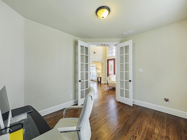 2165 Hidalgo Ln, Frisco, TX 75034 - office with french doors, baseboards, wood finished floors, and arched walkways