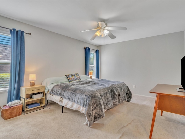 bedroom featuring carpet floors and a ceiling fan