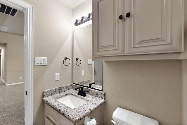 half bath with toilet and vanity