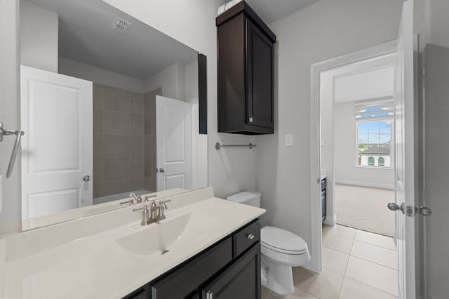 10969 Coastal Violet Rd, Frisco, TX 75035 - bathroom with toilet, tile patterned flooring, vanity, and a shower