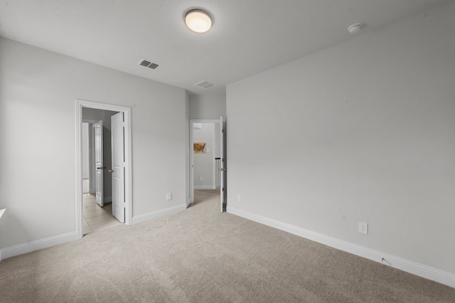 10969 Coastal Violet Rd, Frisco, TX 75035 - unfurnished bedroom featuring light colored carpet and baseboards