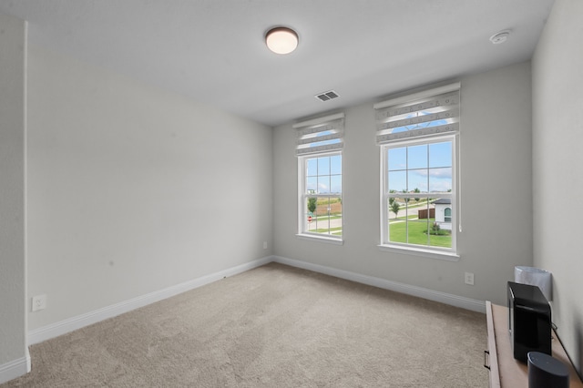 10969 Coastal Violet Rd, Frisco, TX 75035 - carpeted spare room featuring baseboards and a smoke detector