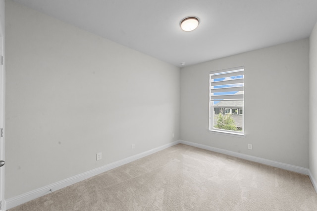 10969 Coastal Violet Rd, Frisco, TX 75035 - spare room featuring baseboards and light colored carpet