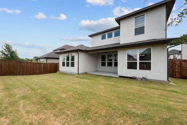 10969 Coastal Violet Rd, Frisco, TX 75035 - back of house featuring stucco siding, a patio area, and a ceiling fan