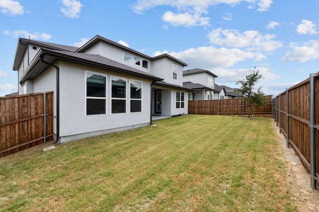 10969 Coastal Violet Rd, Frisco, TX 75035 - rear view of property with stucco siding