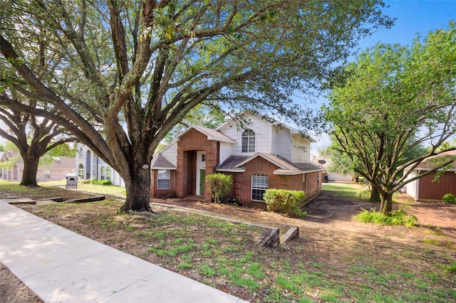 traditional-style house with brick siding