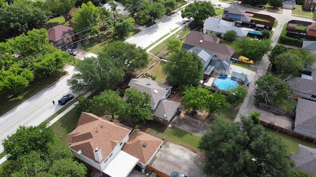 aerial view of residential area featuring a pool