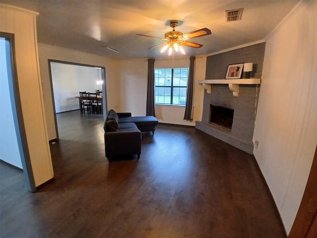 3304 Gorton Rd, Shreveport, LA 71119 - living area with ceiling fan, dark wood finished floors, and a fireplace