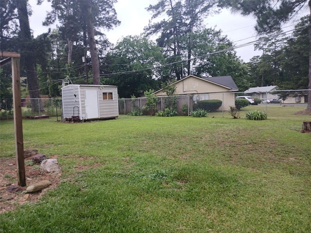 3304 Gorton Rd, Shreveport, LA 71119 - view of yard with a storage unit and an outbuilding