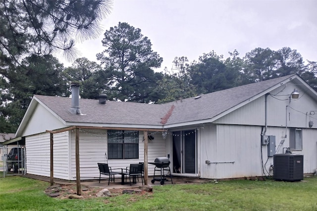 3304 Gorton Rd, Shreveport, LA 71119 - back of property featuring central AC unit, a patio area, and a shingled roof