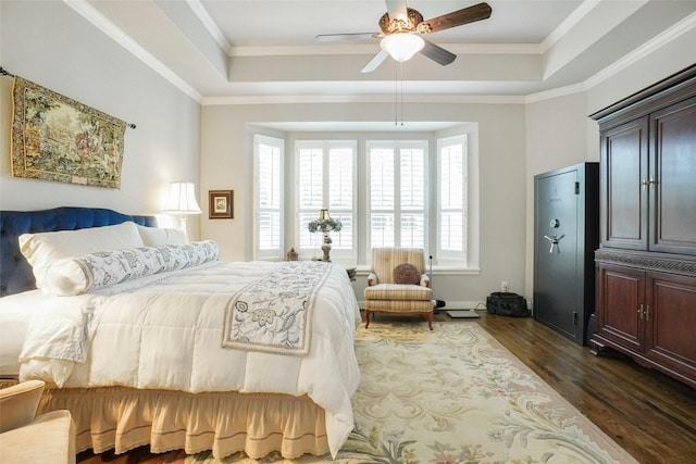 517 Hearth Ter, Argyle, TX 76226 - bedroom with a tray ceiling, dark wood finished floors, ornamental molding, and ceiling fan