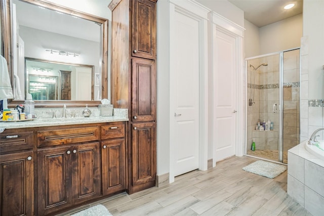 517 Hearth Ter, Argyle, TX 76226 - bathroom featuring a stall shower, vanity, and a bath