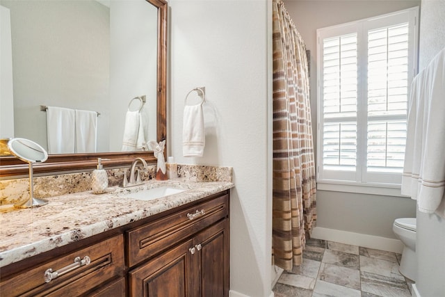 517 Hearth Ter, Argyle, TX 76226 - bathroom featuring vanity, toilet, baseboards, and a shower with shower curtain