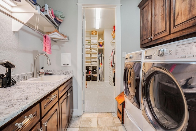 517 Hearth Ter, Argyle, TX 76226 - laundry area with washing machine and clothes dryer and cabinet space