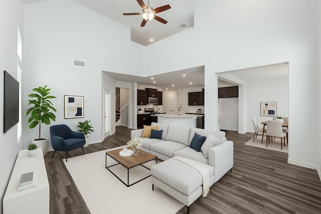 2148 Miramar Dr, Little Elm, TX 75068 - living area featuring ceiling fan, dark wood-style floors, baseboards, a towering ceiling, and recessed lighting