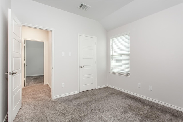 2148 Miramar Dr, Little Elm, TX 75068 - unfurnished bedroom with carpet, lofted ceiling, and baseboards