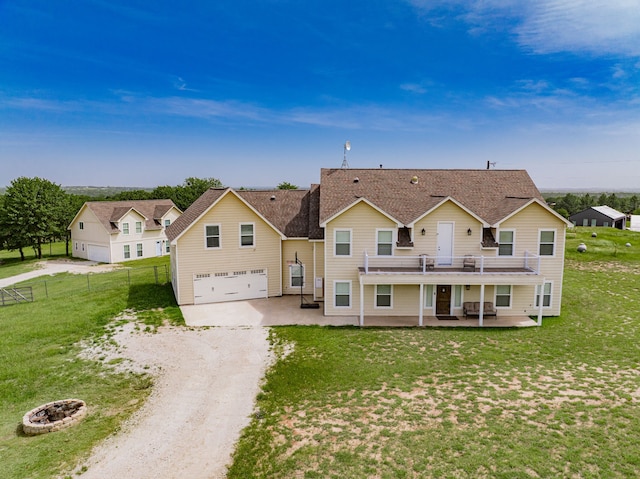 2687 Mcclendon Rd, Weatherford, TX 76088 - rear view of property with driveway, a patio, a wooden deck, an attached garage, and a shingled roof