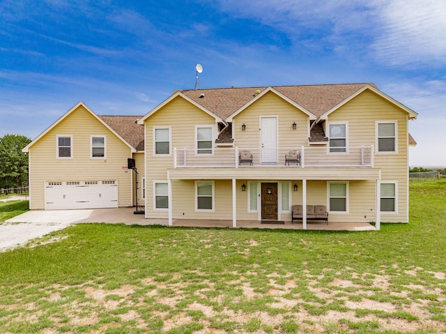 2687 Mcclendon Rd, Weatherford, TX 76088 - view of front facade with a balcony, an attached garage, driveway, a front lawn, and a shingled roof