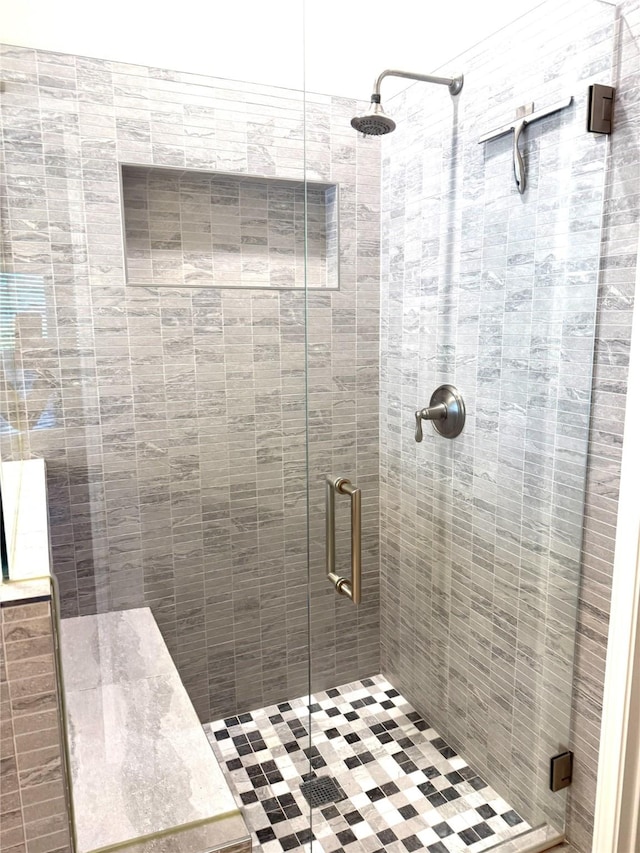 full bath featuring a stall shower