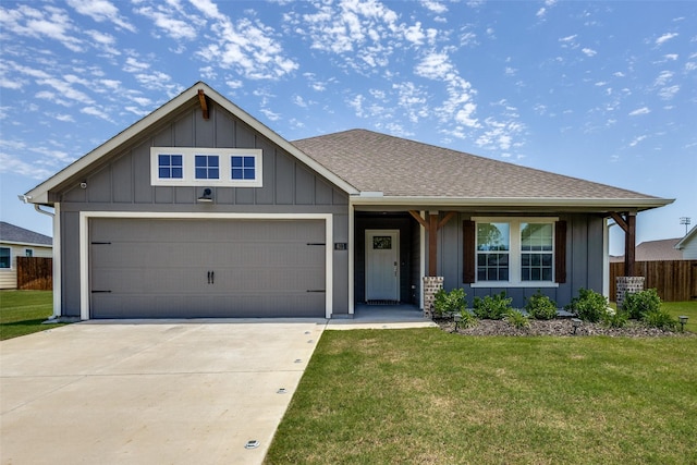 611 Kyle Dr, Tioga, TX 76271 - view of front facade featuring board and batten siding, concrete driveway, an attached garage, and a shingled roof