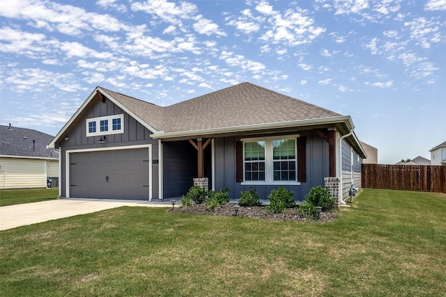 611 Kyle Dr, Tioga, TX 76271 - view of front of home featuring board and batten siding, concrete driveway, a shingled roof, and an attached garage