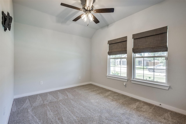 611 Kyle Dr, Tioga, TX 76271 - spare room featuring carpet floors, a ceiling fan, baseboards, and vaulted ceiling