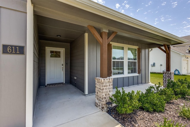 611 Kyle Dr, Tioga, TX 76271 - property entrance with board and batten siding and a porch