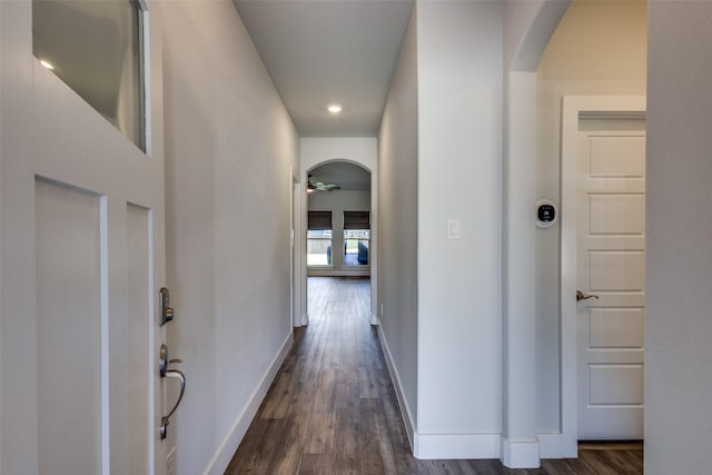 611 Kyle Dr, Tioga, TX 76271 - hall featuring dark wood-style floors, baseboards, arched walkways, and recessed lighting