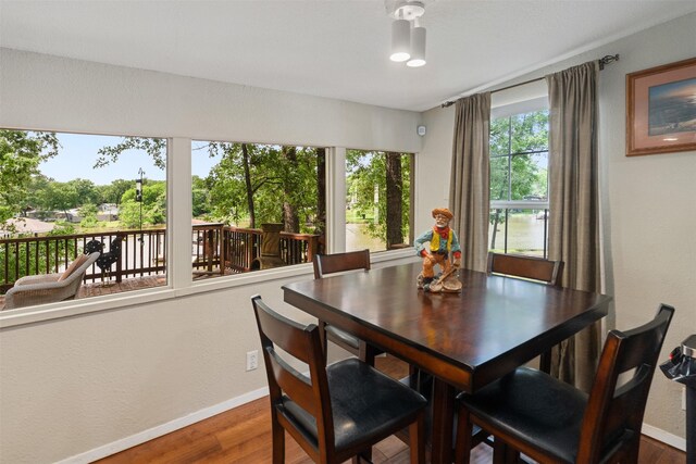 237 Ben Lacy Dr, Gun Barrel City, TX 75156 - dining area featuring baseboards and wood finished floors