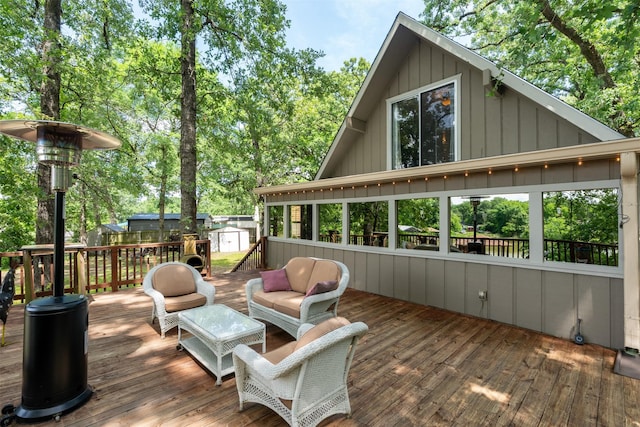 237 Ben Lacy Dr, Gun Barrel City, TX 75156 - deck featuring a shed, an outbuilding, view of scattered trees, and an outdoor hangout area
