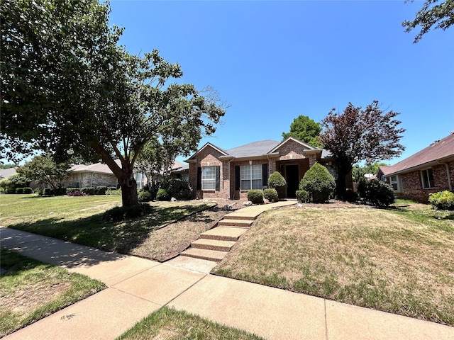 10908 Brandenberg Dr, Frisco, TX 75035 - ranch-style home with brick siding and a front yard