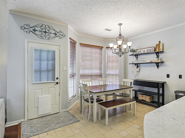 611 Falling Leaf Dr, Allen, TX 75002 - dining space featuring a chandelier, ornamental molding, and a textured ceiling