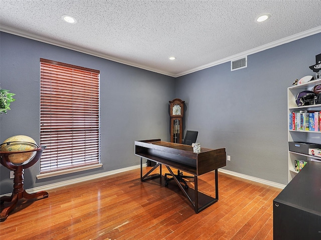 611 Falling Leaf Dr, Allen, TX 75002 - office featuring ornamental molding, a textured ceiling, wood finished floors, recessed lighting, and baseboards