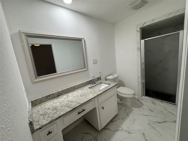 1029 Fox River Ln, Fort Worth, TX 76120 - full bathroom with a stall shower, marble look tile flooring, vanity, and toilet