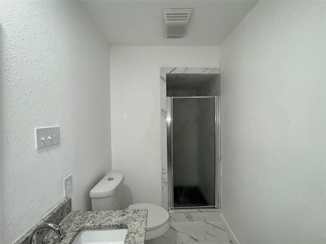 1029 Fox River Ln, Fort Worth, TX 76120 - bathroom featuring toilet, marble finish floors, a shower stall, baseboards, and vanity