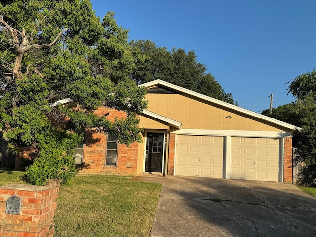 1029 Fox River Ln, Fort Worth, TX 76120 - ranch-style home with driveway, a garage, a front lawn, and brick siding