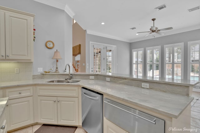 11911 Longfellow Cir, Shreveport, LA 71106 - kitchen featuring stainless steel dishwasher, a sink, ceiling fan, a warming drawer, and plenty of natural light