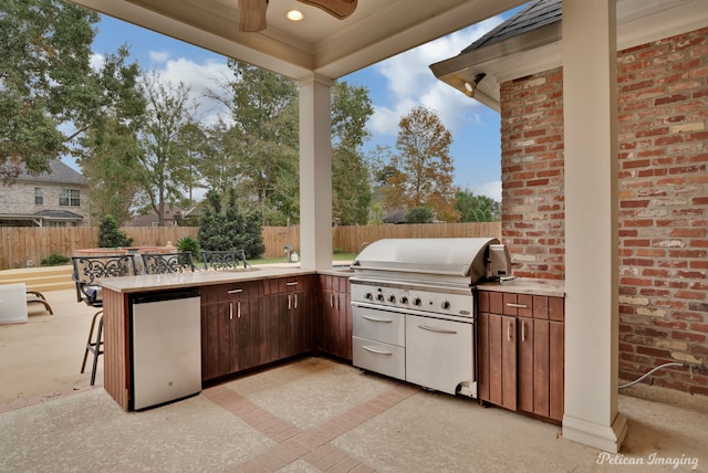 11911 Longfellow Cir, Shreveport, LA 71106 - view of patio / terrace with area for grilling, a fenced backyard, and a ceiling fan