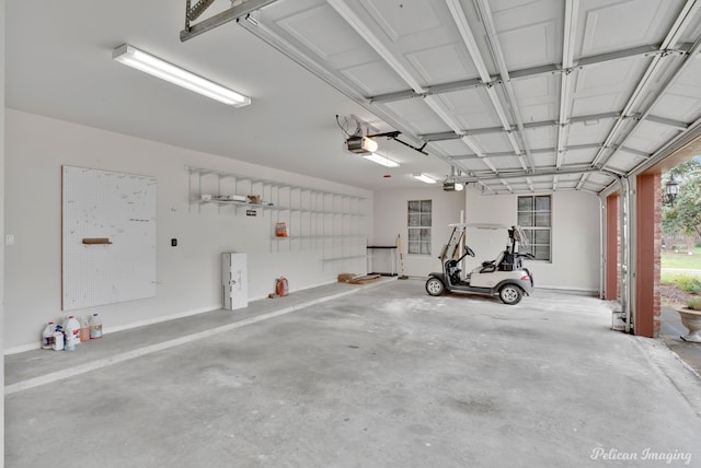 11911 Longfellow Cir, Shreveport, LA 71106 - garage featuring a garage door opener