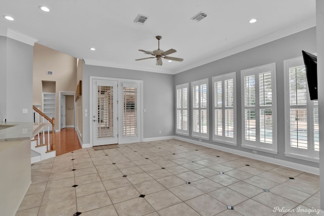 11911 Longfellow Cir, Shreveport, LA 71106 - unfurnished living room featuring crown molding, ceiling fan, recessed lighting, light tile patterned floors, and baseboards