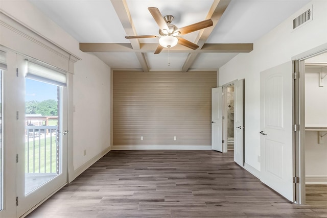 8511 Westover Ct Unit 235, Granbury, TX 76049 - empty room featuring baseboards, wood finished floors, a ceiling fan, coffered ceiling, and beamed ceiling
