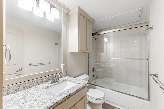 8511 Westover Ct Unit 235, Granbury, TX 76049 - bathroom featuring toilet, combined bath / shower with glass door, and vanity