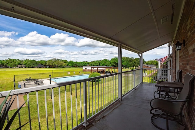 8511 Westover Ct Unit 235, Granbury, TX 76049 - balcony featuring view of pool and view of scattered trees