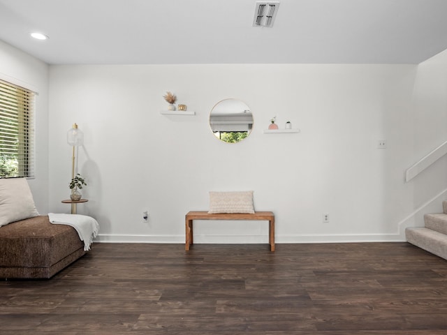 2633 Mccart Ave, Fort Worth, TX 76110 - sitting room with stairway, wood finished floors, baseboards, and recessed lighting